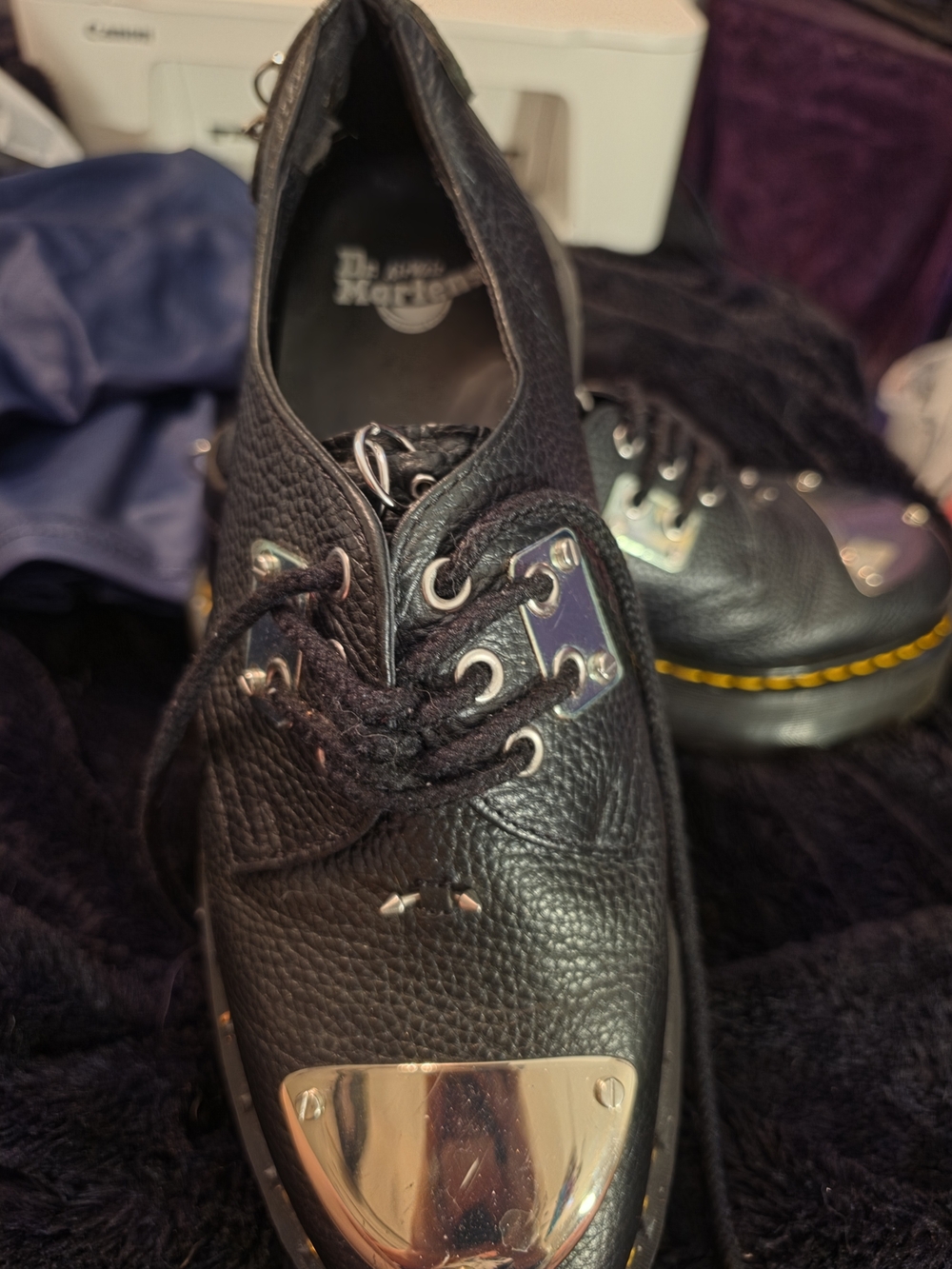 Dr. Martens Black Pebbled Leather Lace-Up Oxfords with Silver Toe Cap
